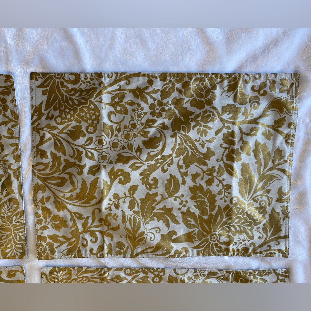 Williams Sonoma
Set of 4 Place Mats 
100% Cotton
Gold floral design
Khaki beige